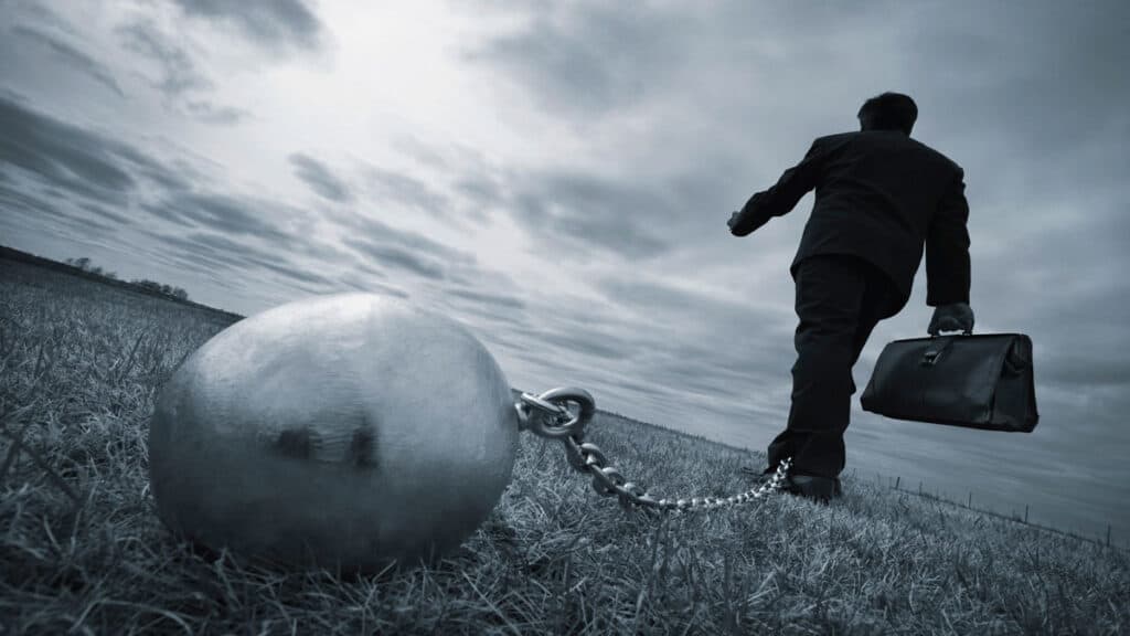 man with a ball and chain