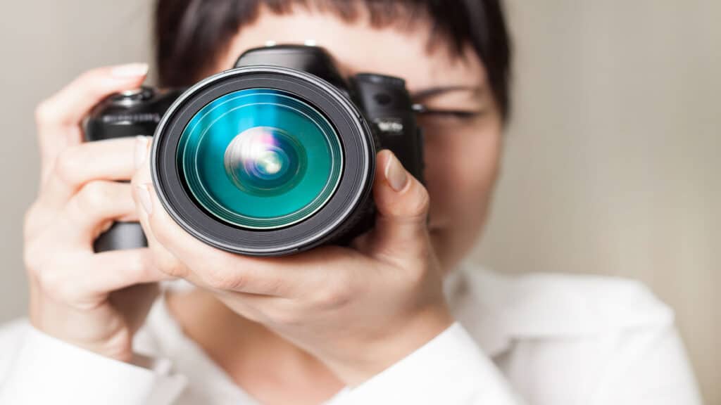 woman using digital camera