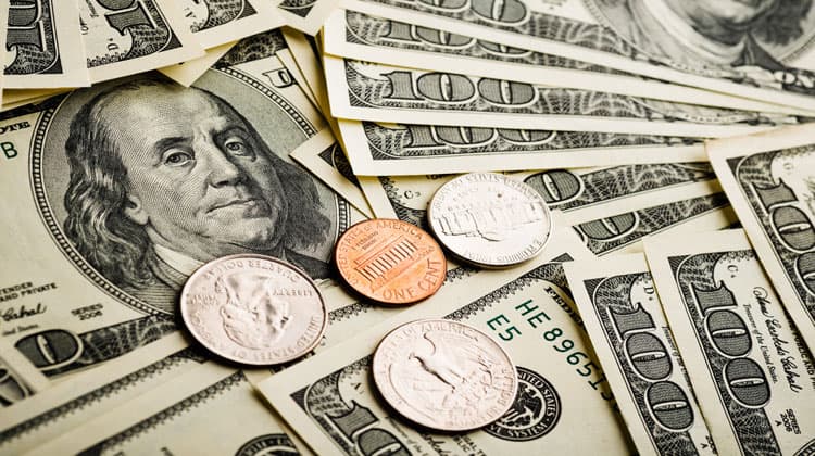 dollar bills and coins