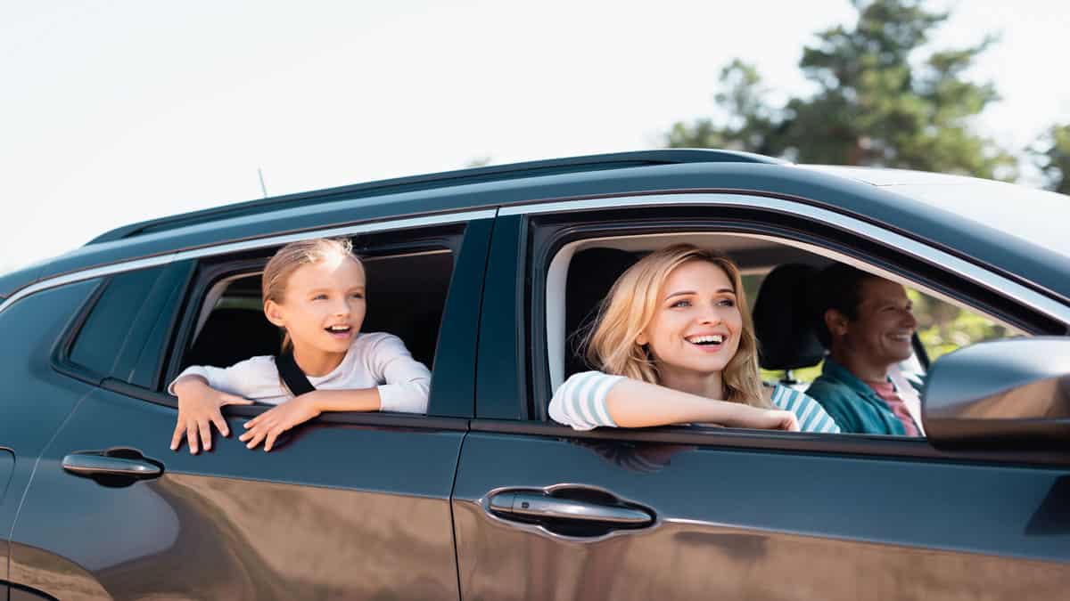 family riding in suv