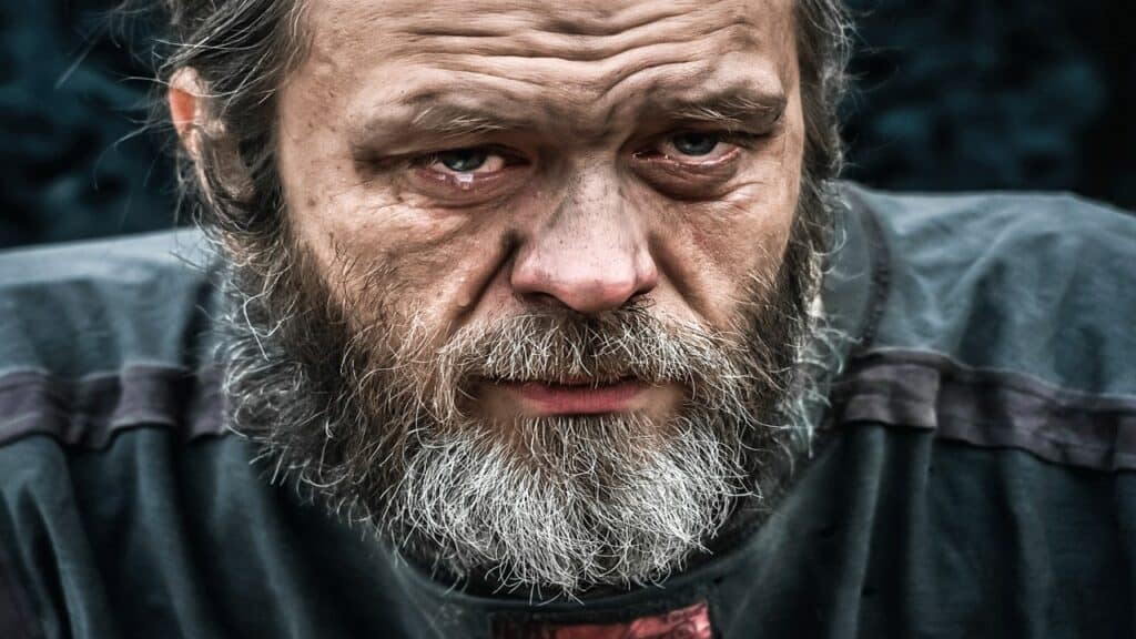 homeless man crying
