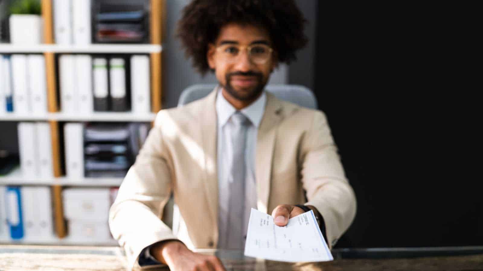 Man paying in check
