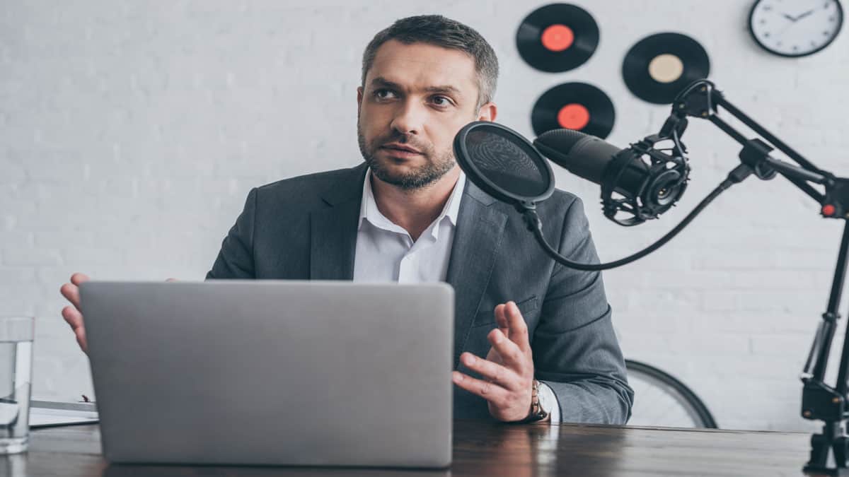 man speaking into microphone