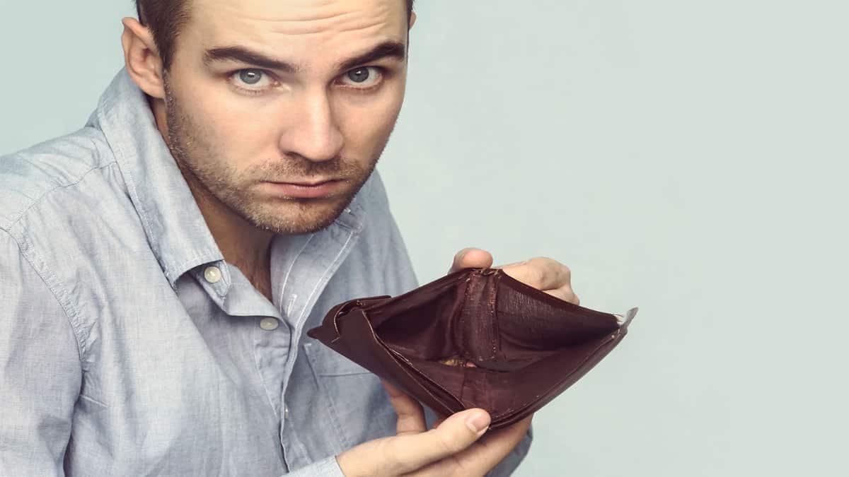 man with empty wallet