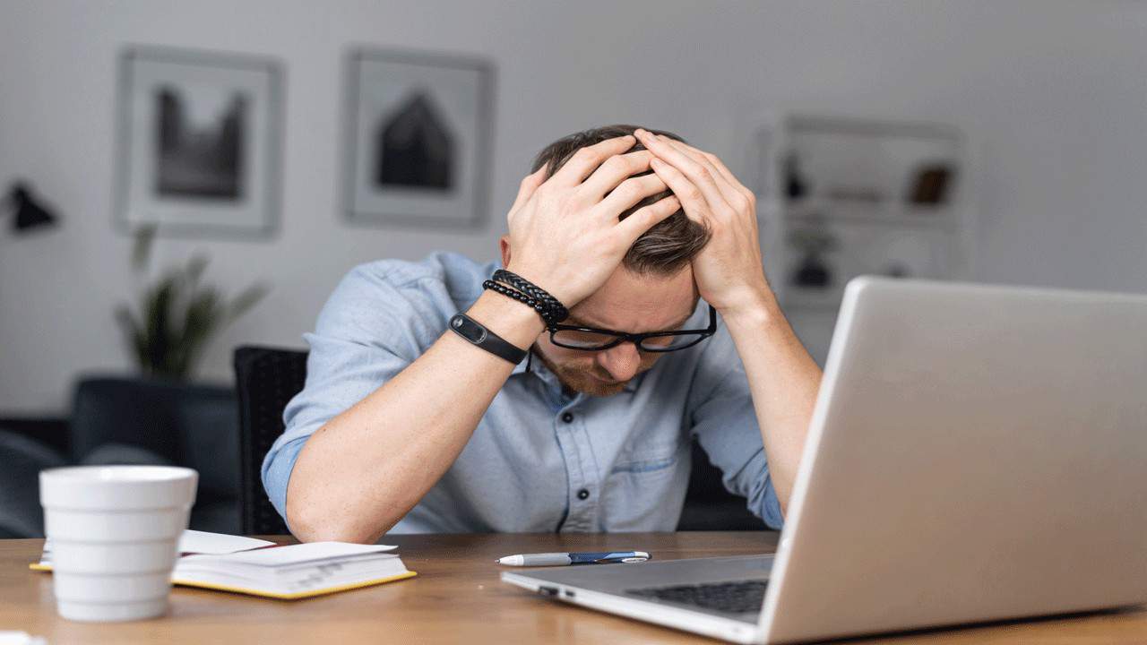 upset man at computer