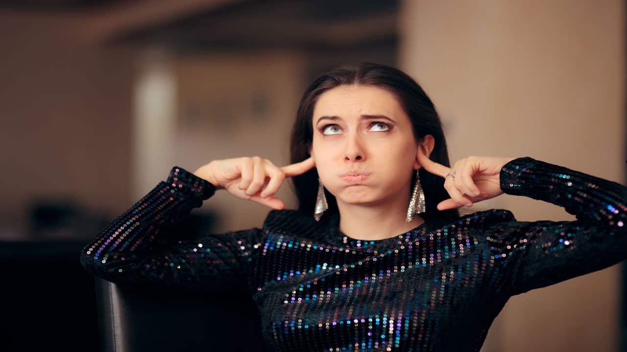 woman-covering-ears