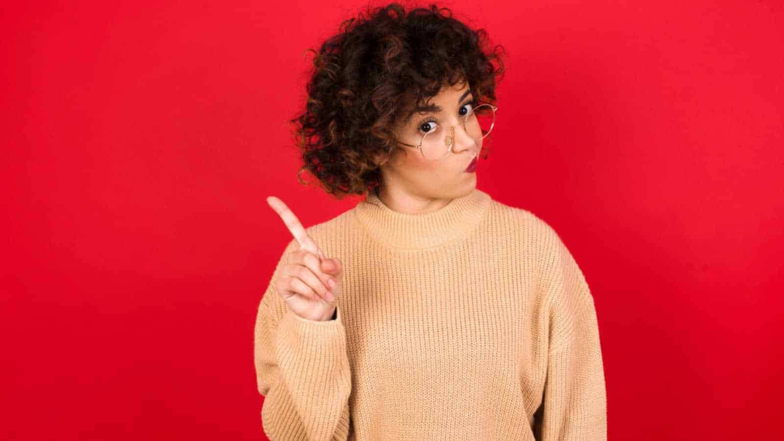 Woman saying no with reaction
