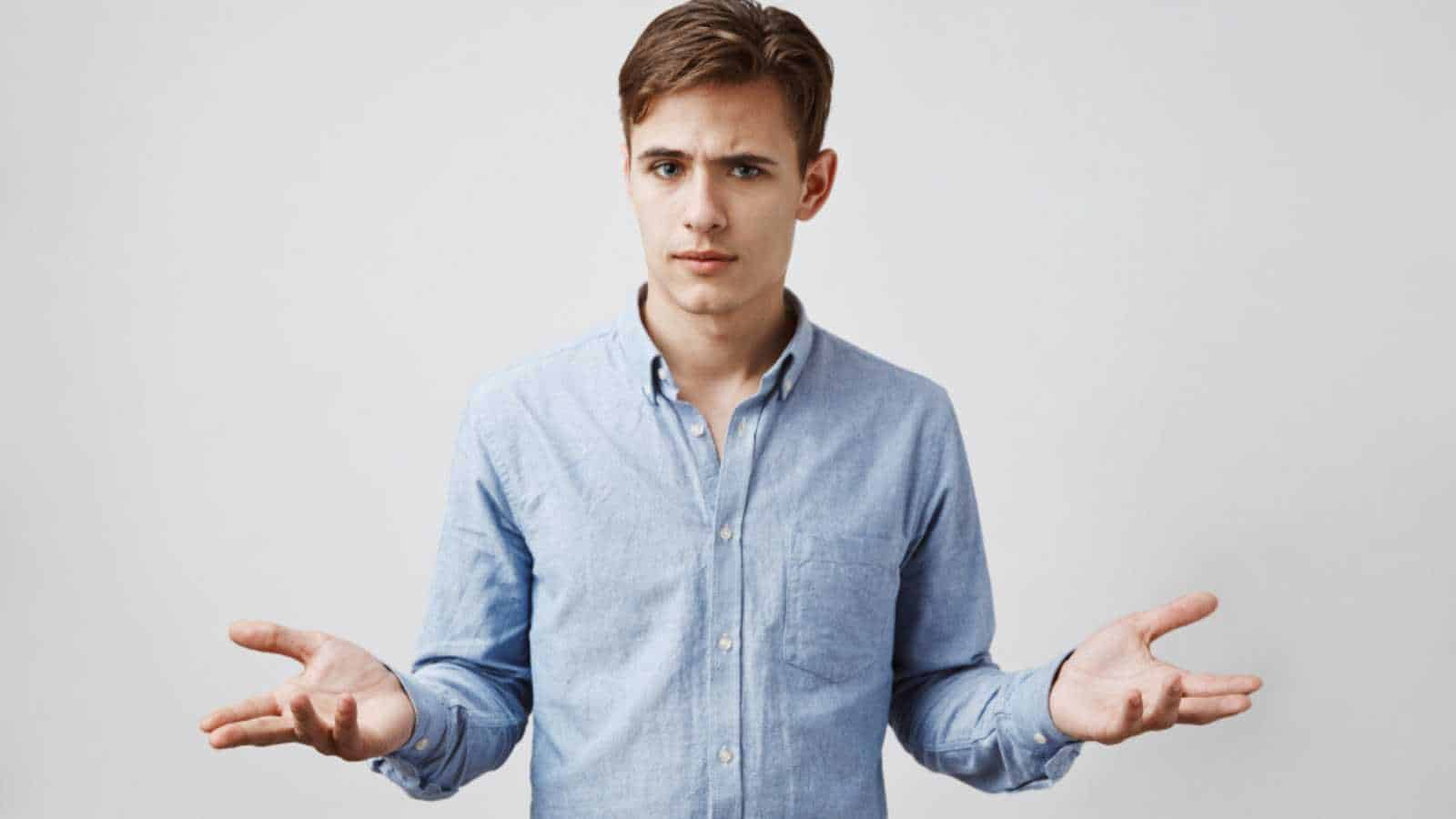 Young Man shrugging